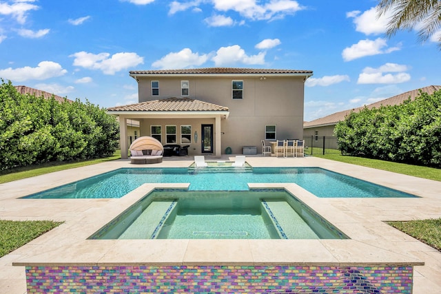 6458 SW Key Deer Ln, Palm City, FL 34990 - view of pool with a patio and a pool with connected hot tub