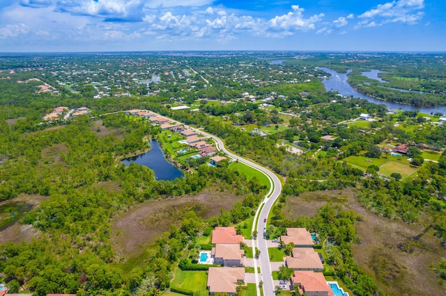 6458 SW Key Deer Ln, Palm City, FL 34990 - aerial perspective of suburban area featuring a nearby body of water