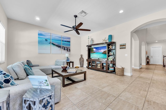 6458 SW Key Deer Ln, Palm City, FL 34990 - living area featuring arched walkways, ceiling fan, recessed lighting, and light tile patterned floors