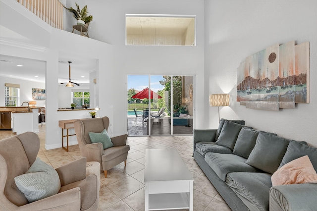 8110 Brigamar Isles Ave, Boynton Beach, FL 33473 - living area featuring light tile patterned flooring, a towering ceiling, and recessed lighting