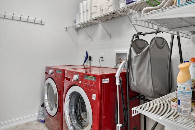 8110 Brigamar Isles Ave, Boynton Beach, FL 33473 - laundry room with independent washer and dryer, a textured wall, and tile patterned flooring
