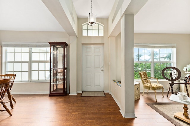 397 SW Jeanne Ave, Port Saint Lucie, FL 34953 - foyer featuring healthy amount of natural light and wood finished floors