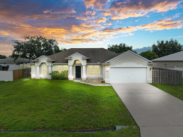 397 SW Jeanne Ave, Port Saint Lucie, FL 34953 - single story home with an attached garage, stucco siding, driveway, and roof with shingles
