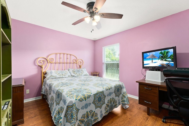 397 SW Jeanne Ave, Port Saint Lucie, FL 34953 - bedroom featuring dark wood-style floors, ceiling fan, and an office area