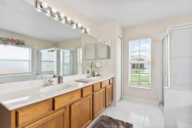 397 SW Jeanne Ave, Port Saint Lucie, FL 34953 - full bathroom featuring double vanity, a stall shower, and tile patterned floors