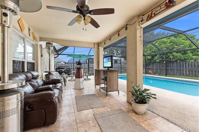 397 SW Jeanne Ave, Port Saint Lucie, FL 34953 - view of swimming pool with a patio area, a fenced backyard, glass enclosure, and a ceiling fan