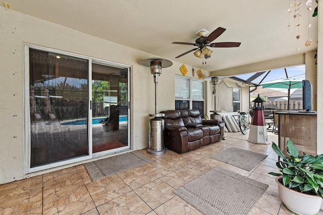 397 SW Jeanne Ave, Port Saint Lucie, FL 34953 - view of patio / terrace featuring a ceiling fan and glass enclosure