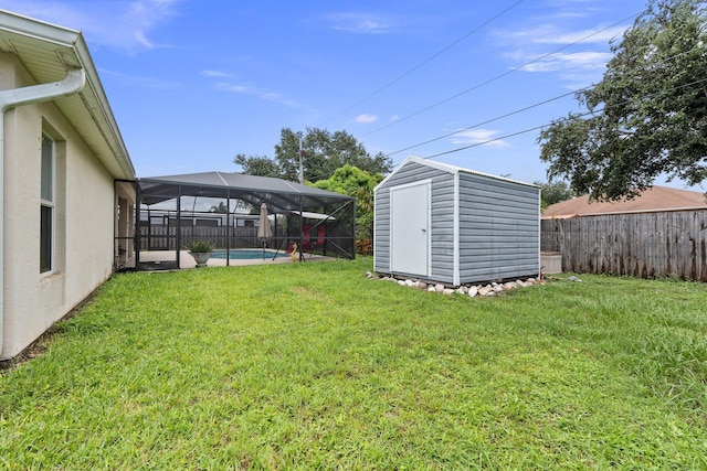 397 SW Jeanne Ave, Port Saint Lucie, FL 34953 - fenced backyard with a storage shed and glass enclosure