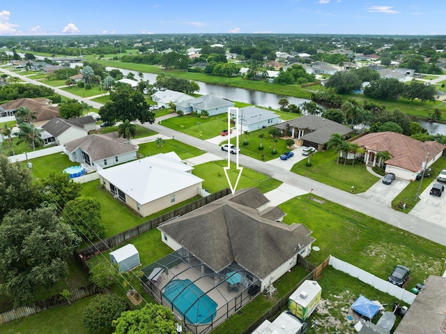 397 SW Jeanne Ave, Port Saint Lucie, FL 34953 - aerial perspective of suburban area featuring a nearby body of water