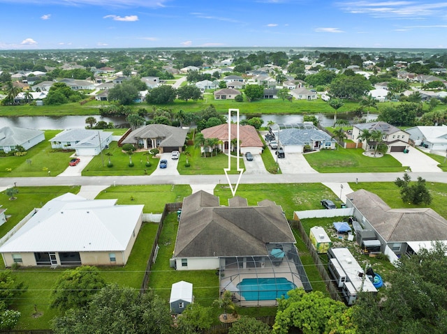 397 SW Jeanne Ave, Port Saint Lucie, FL 34953 - aerial view of residential area featuring a nearby body of water