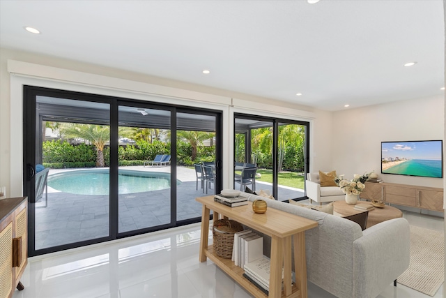 910 SW 21st St, Boca Raton, FL 33486 - living area featuring healthy amount of natural light, recessed lighting, and light tile patterned floors