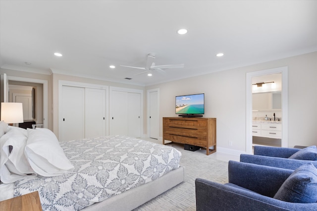 910 SW 21st St, Boca Raton, FL 33486 - bedroom with multiple closets, recessed lighting, ornamental molding, ensuite bathroom, and ceiling fan