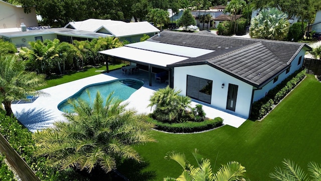 910 SW 21st St, Boca Raton, FL 33486 - outdoor pool with a patio area and a yard