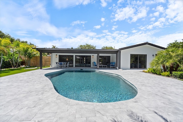 910 SW 21st St, Boca Raton, FL 33486 - swimming pool featuring a patio area