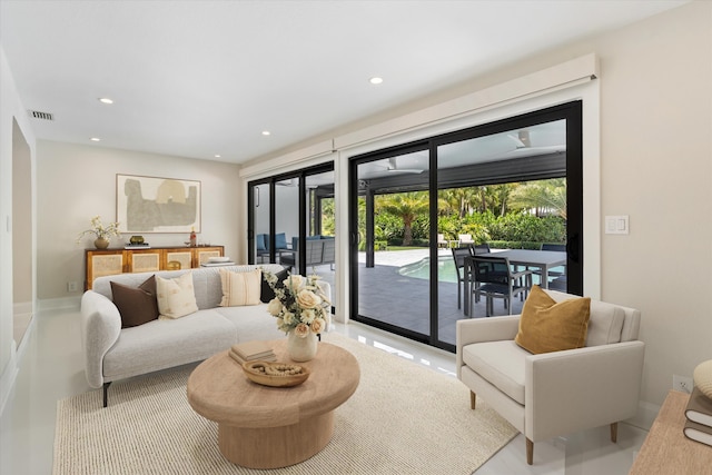 910 SW 21st St, Boca Raton, FL 33486 - living room featuring healthy amount of natural light and recessed lighting