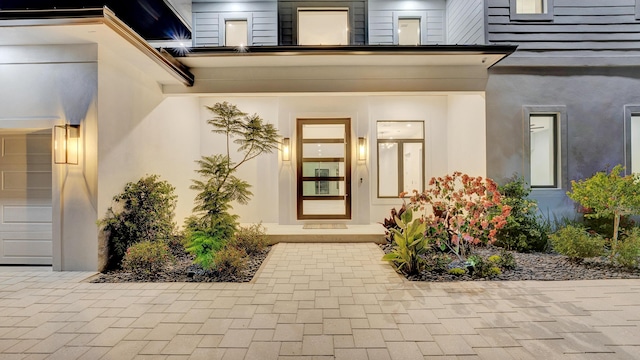 811 Chukker Rd, Delray Beach, FL 33483 - view of exterior entry featuring stucco siding and a porch