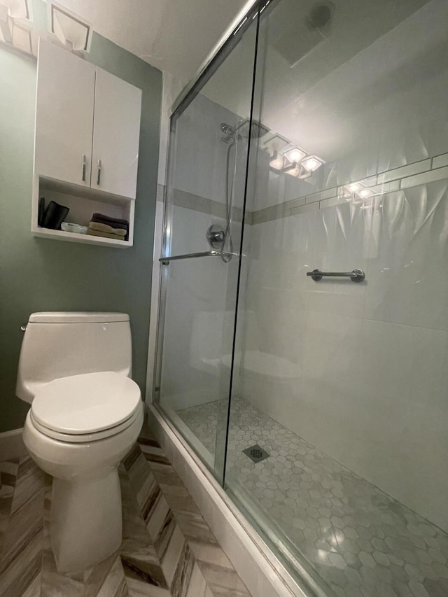 1033 Newport H Unit 1033, Deerfield Beach, FL 33442 - full bathroom featuring a stall shower and toilet