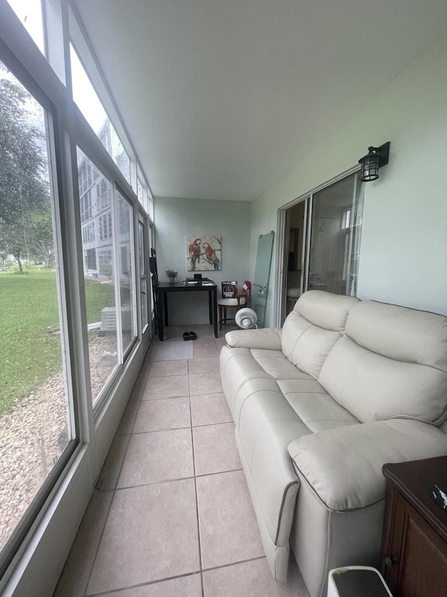 1033 Newport H Unit 1033, Deerfield Beach, FL 33442 - sunroom featuring healthy amount of natural light and tile patterned floors