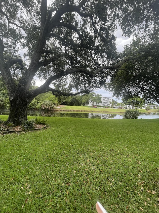 1033 Newport H Unit 1033, Deerfield Beach, FL 33442 - view of grassy yard with a water view