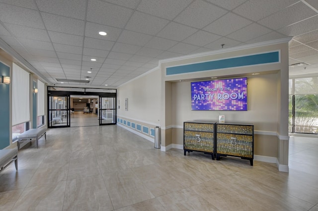 1033 Newport H Unit 1033, Deerfield Beach, FL 33442 - lobby with a paneled ceiling, crown molding, and recessed lighting
