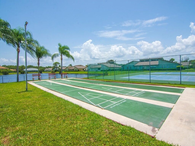 1706 Lakefront Blvd Unit D, Fort Pierce, FL 34982 - view of property's community with a tennis court and shuffleboard