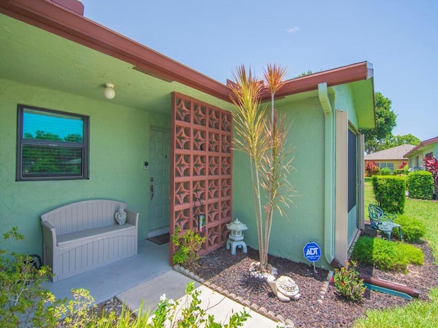 1706 Lakefront Blvd Unit D, Fort Pierce, FL 34982 - view of exterior entry with stucco siding