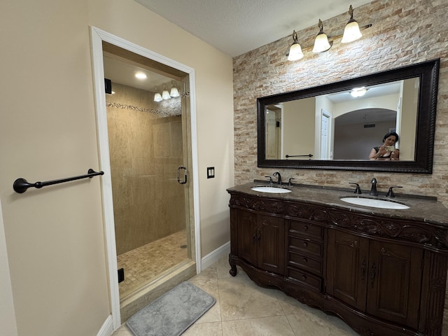 674 Springdale Cir, Palm Springs, FL 33461 - full bath with a stall shower, double vanity, and tile patterned floors