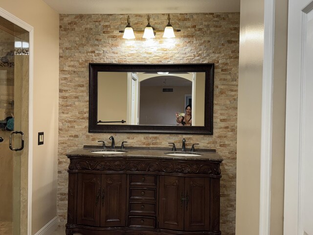 674 Springdale Cir, Palm Springs, FL 33461 - bathroom with a stall shower and double vanity