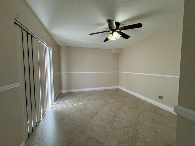674 Springdale Cir, Palm Springs, FL 33461 - unfurnished room featuring ceiling fan and light tile patterned flooring