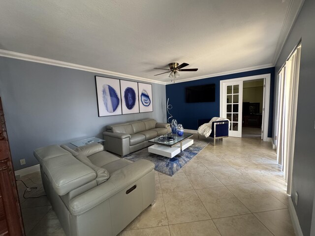 674 Springdale Cir, Palm Springs, FL 33461 - living area with crown molding, ceiling fan, french doors, and light tile patterned floors