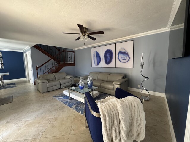 674 Springdale Cir, Palm Springs, FL 33461 - living room featuring ornamental molding, stairs, ceiling fan, and a textured ceiling