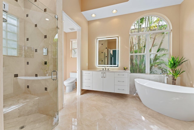 191 Sedona Way, Palm Beach Gardens, FL 33418 - full bath featuring vanity, a stall shower, marble tiled floors, a freestanding tub, and recessed lighting