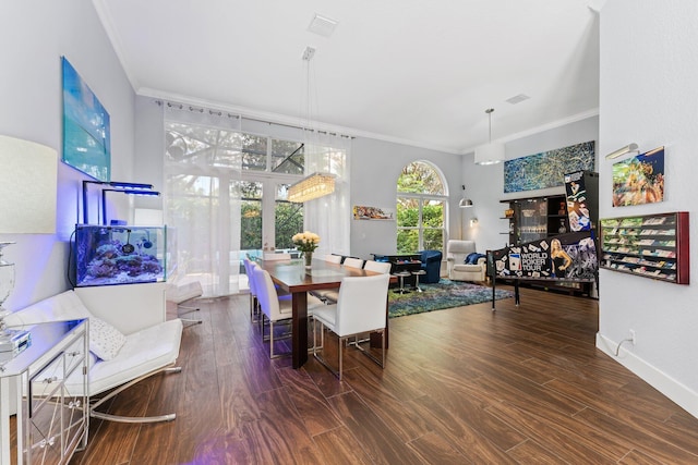 191 Sedona Way, Palm Beach Gardens, FL 33418 - dining space featuring ornamental molding and wood finished floors