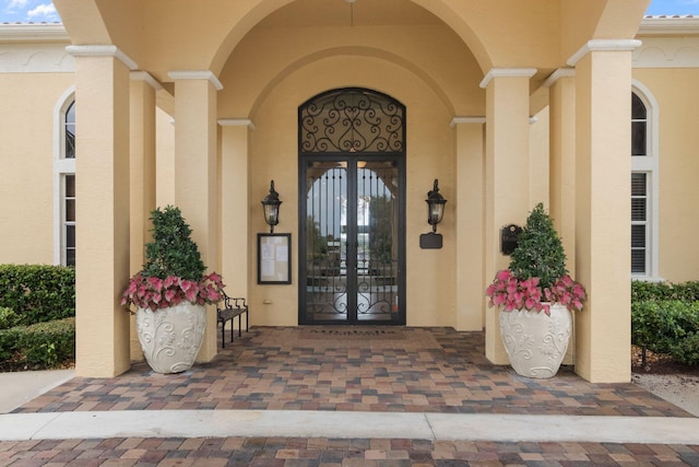 191 Sedona Way, Palm Beach Gardens, FL 33418 - view of exterior entry with stucco siding