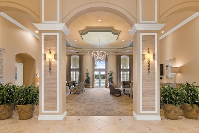 191 Sedona Way, Palm Beach Gardens, FL 33418 - entrance foyer with crown molding, recessed lighting, light tile patterned flooring, a raised ceiling, and decorative columns