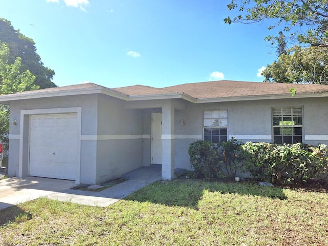 701 NW 15th Ct, Pompano Beach, FL 33060 - ranch-style home featuring stucco siding, an attached garage, roof with shingles, and a front lawn