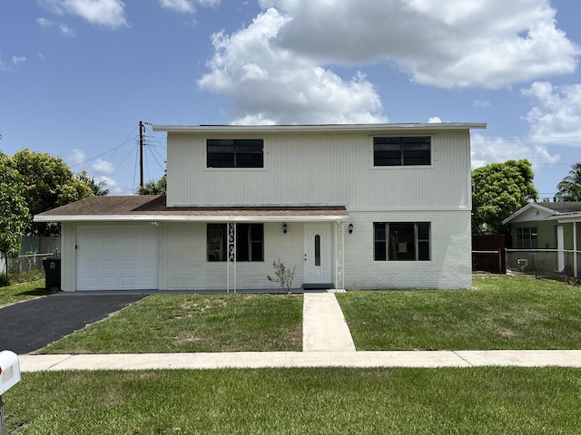 5163 Marion Pl, West Palm Beach, FL 33407 - traditional-style home with a garage, brick siding, asphalt driveway, and a porch
