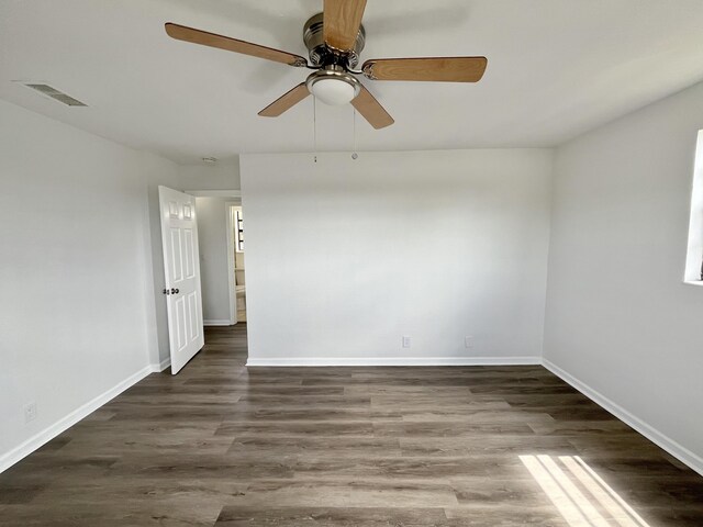 5163 Marion Pl, West Palm Beach, FL 33407 - unfurnished room with wood finished floors and ceiling fan
