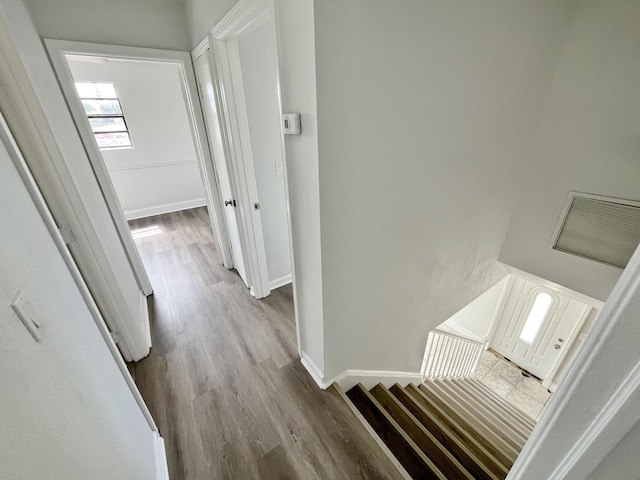5163 Marion Pl, West Palm Beach, FL 33407 - corridor with wood finished floors and baseboards