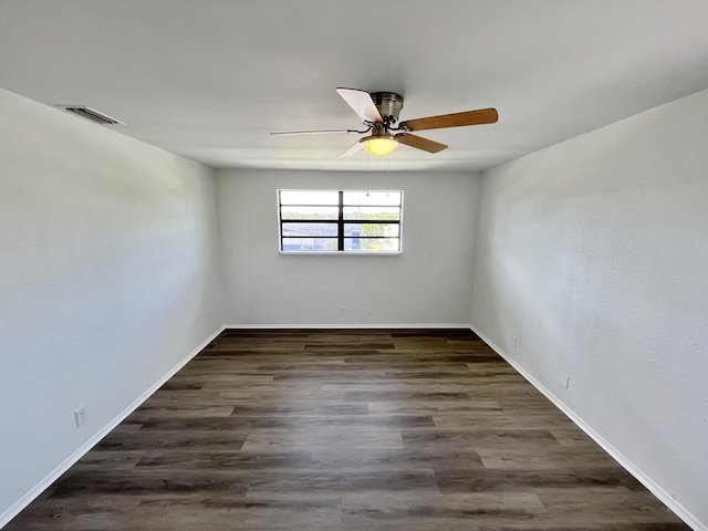 5163 Marion Pl, West Palm Beach, FL 33407 - unfurnished room with ceiling fan and dark wood-style flooring