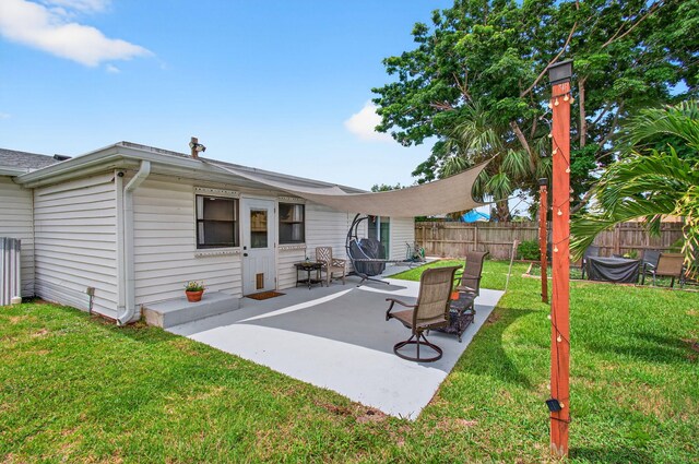 826 Cochran Dr, Lake Worth Beach, FL 33461 - back of property featuring a patio area