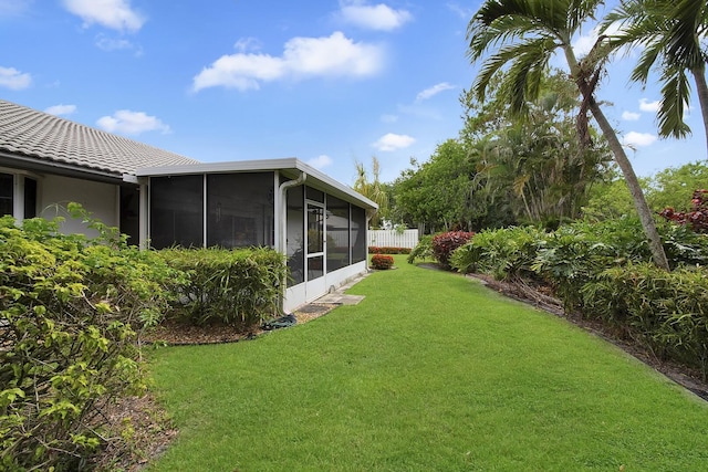 8291 Lake Cypress Rd, Lake Worth, FL 33467 - view of green lawn with a sunroom