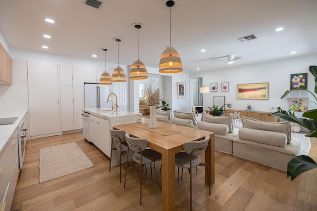 3245 Wymberly Dr, Jupiter, FL 33458 - dining room featuring light wood finished floors and recessed lighting