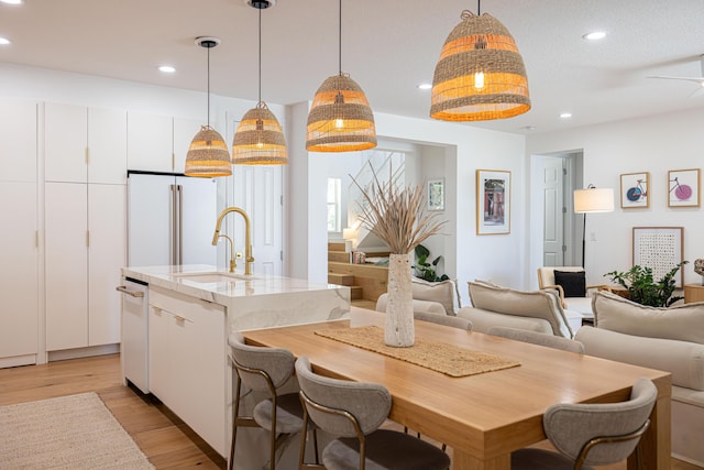 3245 Wymberly Dr, Jupiter, FL 33458 - dining area with light wood finished floors and recessed lighting