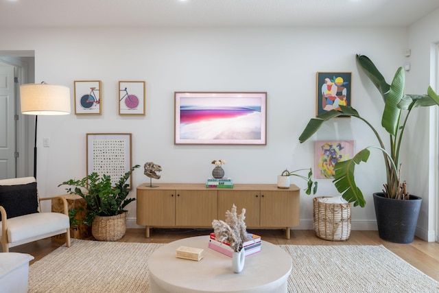 3245 Wymberly Dr, Jupiter, FL 33458 - living area featuring light wood finished floors and baseboards