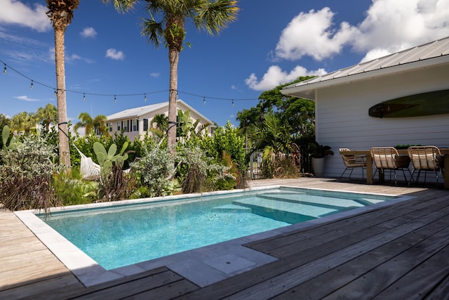 3245 Wymberly Dr, Jupiter, FL 33458 - swimming pool featuring a deck