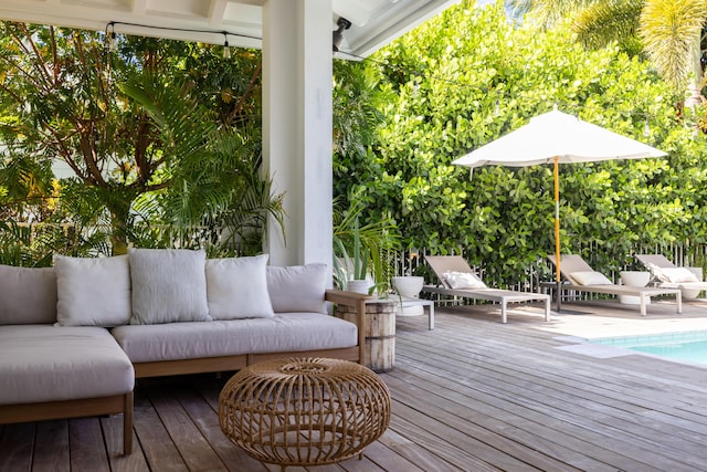 3245 Wymberly Dr, Jupiter, FL 33458 - deck featuring an outdoor living space and an outdoor pool