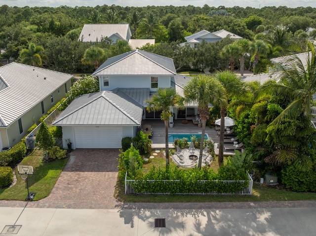 3245 Wymberly Dr, Jupiter, FL 33458 - view from above of property with a forest and a pool area