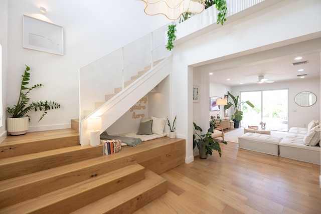 3245 Wymberly Dr, Jupiter, FL 33458 - staircase with wood finished floors, recessed lighting, and ceiling fan