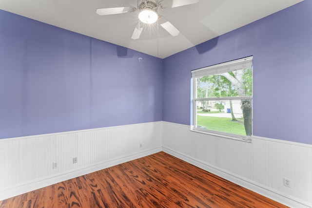 918 SW Blue Stem Way, Stuart, FL 34997 - unfurnished room with wainscoting, a ceiling fan, and wood finished floors